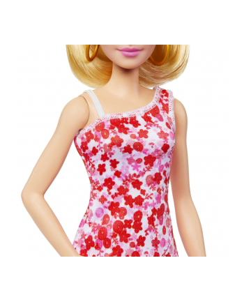 Mattel Barbie Fashionistas doll with blonde ponytail and floral dress