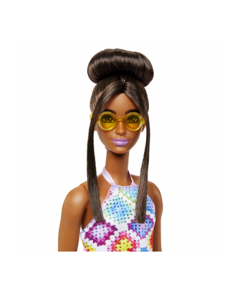 Mattel Barbie Fashionistas doll wearing a bun and crocheted dress