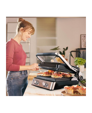 Braun Multigrill 7 CG7020 czarny/inox Grill kontaktowy| Moc [w]: 2000 | Kolor: czarny/inox | płytki: 1 grillowa, 1 płaska | Wymiary [wys.x gł.x szer. cm]: 36,5x31,5x17,3