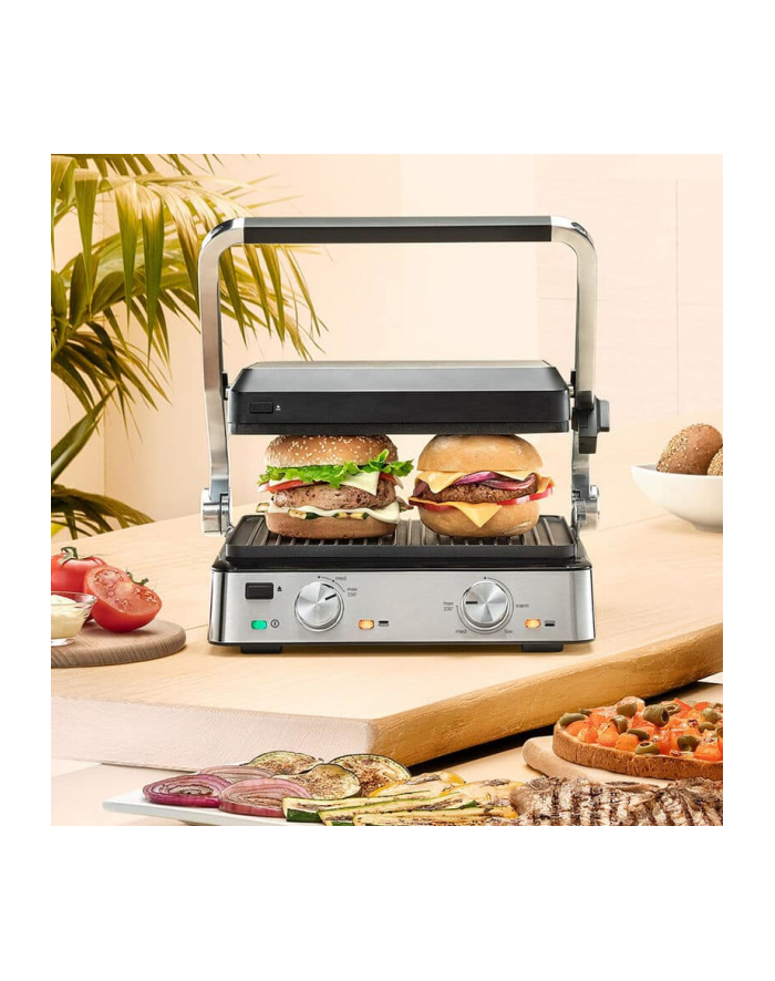 Braun Multigrill 7 CG7020 czarny/inox Grill kontaktowy| Moc [w]: 2000 | Kolor: czarny/inox | płytki: 1 grillowa, 1 płaska | Wymiary [wys.x gł.x szer. cm]: 36,5x31,5x17,3 główny